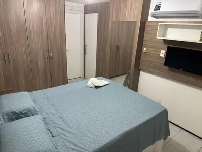 Uma cama ou camas num quarto em Cond Sol Maior 201 A Mucuripe