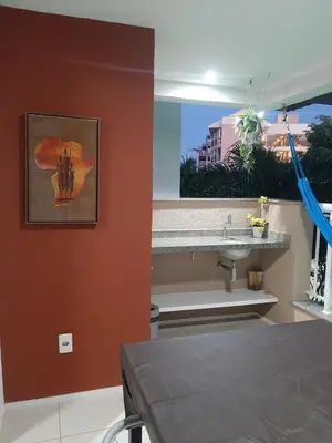 Uma televisão e/ou sistema de entretenimento em Apartamento Porto das Dunas