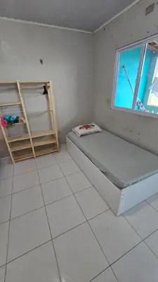 Uma cama ou camas num quarto em Pousada Madri