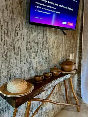 Uma televisão e/ou sistema de entretenimento em Village Choça