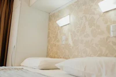 Uma cama ou camas num quarto em Classic Residence