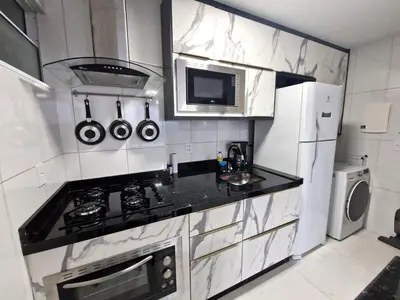 A cozinha ou kitchenette de Aquarius Residence 806 Vista Mar