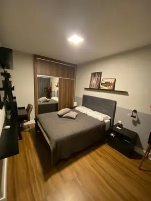 Uma cama ou camas num quarto em Apt 3BR luxo com 2 garagens na melhor localização