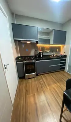 A cozinha ou kitchenette de Apt 3BR luxo com 2 garagens na melhor localização