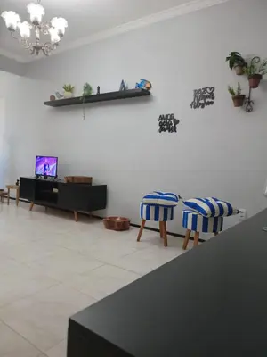 Uma televisão e/ou sistema de entretenimento em Aconchego e Localização