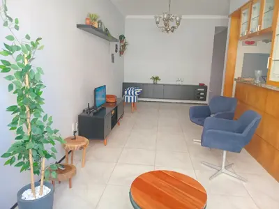 Uma área de estar em Aconchego e Localização