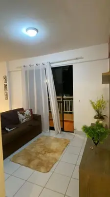 Uma área de estar em Porto das Dunas, 2 quartos