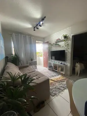 Uma televisão e/ou sistema de entretenimento em Apartamento 2 quartos Next to Beira Mar
