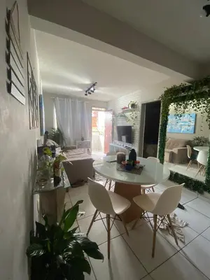 Uma área de estar em Apartamento 2 quartos Next to Beira Mar