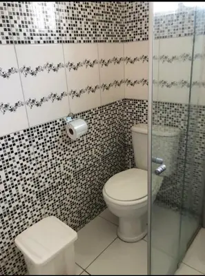 Uma casa de banho em Cris hospedagem