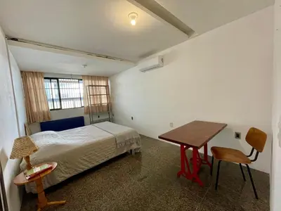 Uma cama ou camas num quarto em Quarto no bairro Meireles à 50m da Beira-Mar