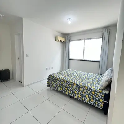 Uma cama ou camas num quarto em Casa Sol Nascente