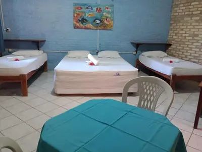 Uma cama ou camas num quarto em Hotel das Falésias Praia das Fontes