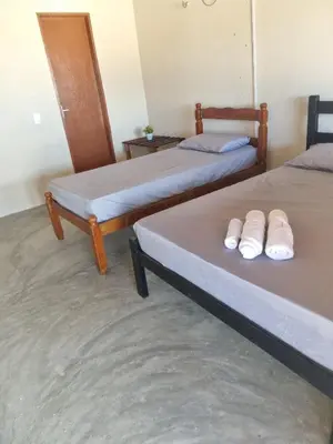 Uma cama ou camas num quarto em Canto das Ondas