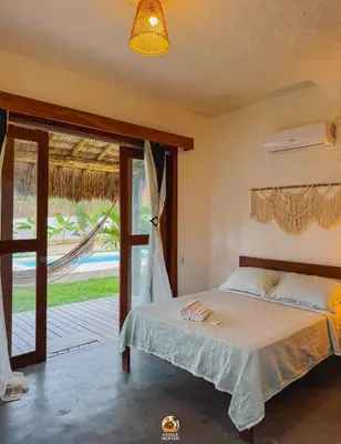 Uma cama ou camas num quarto em Moitas Chalés