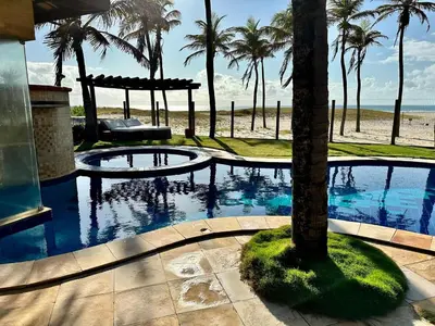 A piscina em ou perto de Casa pé na areia, com 5 quartos