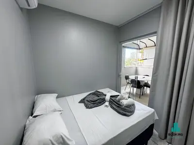 Uma cama ou camas num quarto em River Park Centro de Eventos