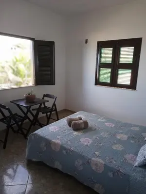 Uma cama ou camas num quarto em Casa de Praia em Aracati - 