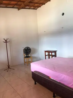 Uma cama ou camas num quarto em Recanto Beach casa de Temporada