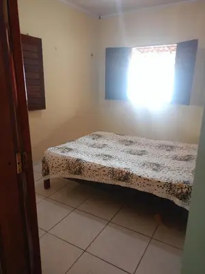Uma cama ou camas num quarto em Casa em Paracuru carlotas