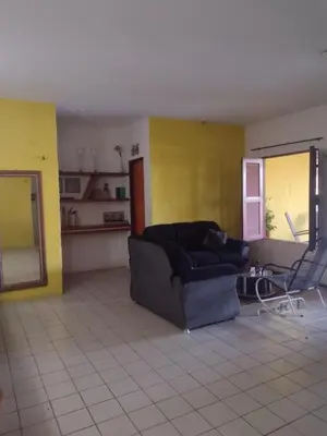 Uma área de estar em Casa de temporada paraíso jeri