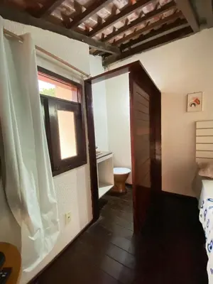 Uma casa de banho em bouguenville flats guaramiranga