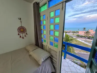 Uma cama ou camas num quarto em Porto Canoa Residence