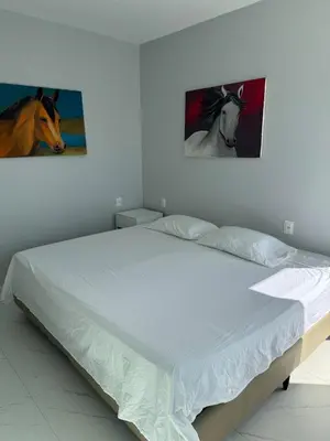 Uma cama ou camas num quarto em Luxury Mansion in Porto das Dunas