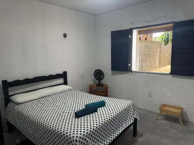 Uma cama ou camas num quarto em Casa de Veraneio