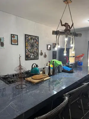 Uma área de estar em Casa de Veraneio
