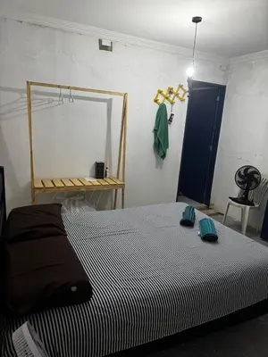 Uma cama ou camas num quarto em Casa de Veraneio