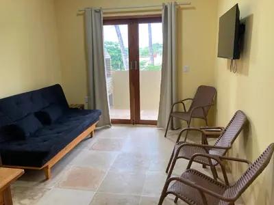 Uma televisão e/ou sistema de entretenimento em Jeri Cottage