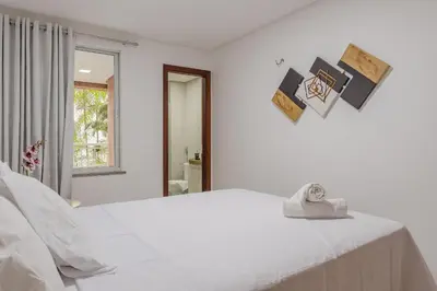 Uma cama ou camas num quarto em Scopa Beach #C1-200 - Beira mar por Carpediem