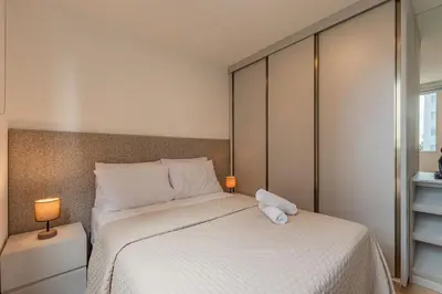 Uma cama ou camas num quarto em Mirante #207 - Quádruplo confortável por Carpediem