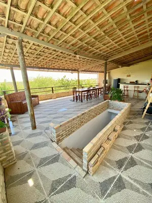 Uma área de estar em Cata residence