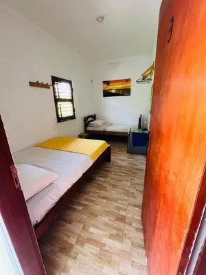 Uma cama ou camas num quarto em Cata residence