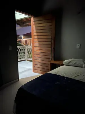 Uma cama ou camas num quarto em Chalé Casa Moitas