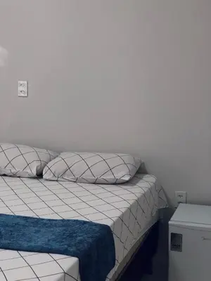 Uma cama ou camas num quarto em Chalé Casa Moitas