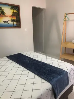 Uma cama ou camas num quarto em Chalé Casa Moitas