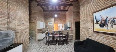 Uma área de estar em Casa de praia