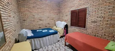 Uma cama ou camas num quarto em Casa de praia