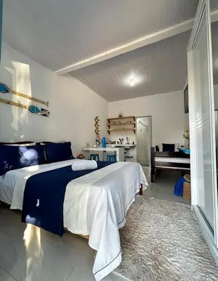 Uma cama ou camas num quarto em Suite Santorini Jericoacoara