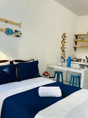 Uma cama ou camas num quarto em Suite Santorini Jericoacoara