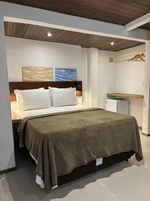 Uma cama ou camas num quarto em Casa Manari