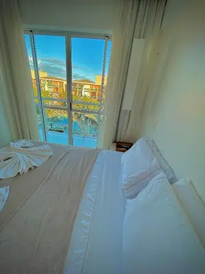 Uma cama ou camas num quarto em Palm Beach Cobertura Duplex ao lado do Beach Park