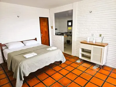 Uma cama ou camas num quarto em Chalé PDD