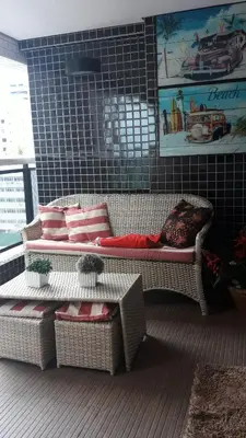 Uma área de estar em Maravilhoso Apartamento na Beira Mar