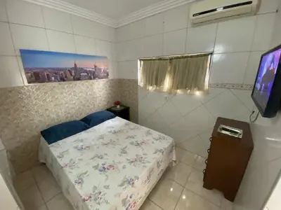 Uma cama ou camas num quarto em Residence Fonteles