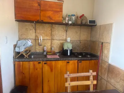 A cozinha ou kitchenette de Ondas do mar Taiba Residence
