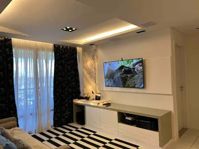Uma televisão e/ou sistema de entretenimento em Mandara Lanai Resort - Porto das Dunas - Beach Park